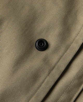 Khaki all-weather trench coat fabric and black button detail
