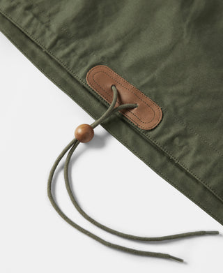 Olive cotton parka drawstring with brown leather tab and wooden bead