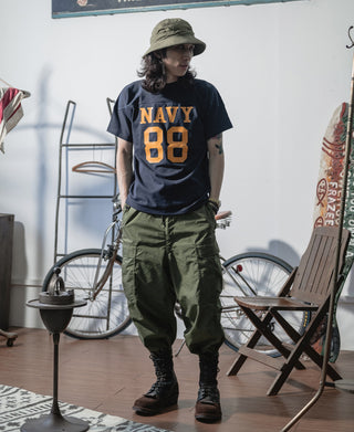 Olive arctic cargo trousers with flap pockets and gathered ankle cuffs