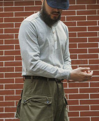 Gray long-sleeve henley shirt, partial front view with buttoned neckline