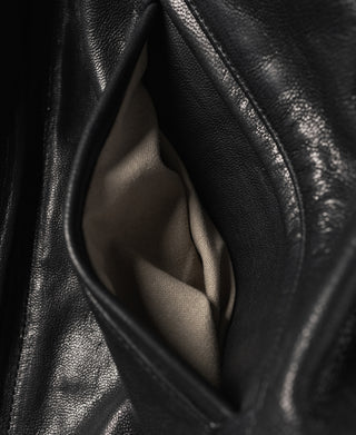 Black goatskin leather jacket inner pocket opening with fabric lining
