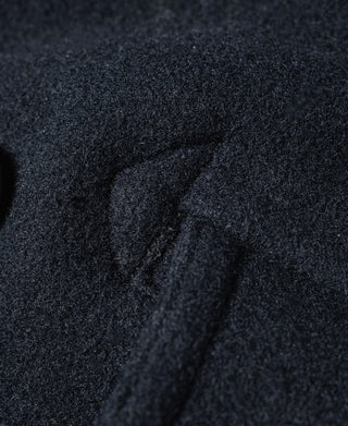 Navy peacoat fabric texture close-up