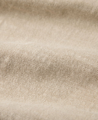 Light tan cotton T-shirt fabric texture close-up