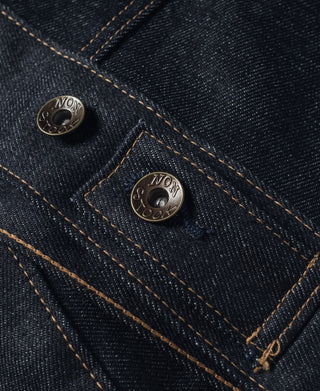 Indigo denim jacket flap pocket with two embossed metal buttons
