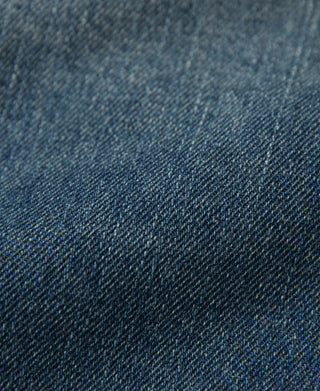Close-up of blue slub denim fabric texture