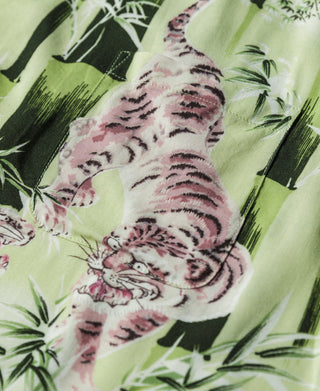 Light green aloha shirt with tiger and bamboo print in pink, black, and white