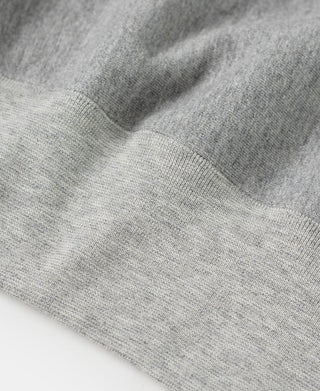 Heather gray sweatshirt fabric texture with ribbed shoulder seam detail