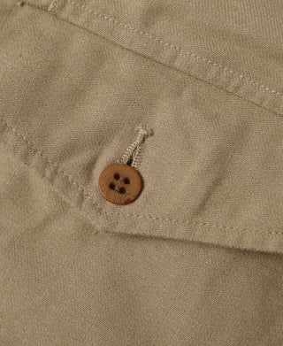 Khaki bermuda shorts with small button on cargo pocket flap
