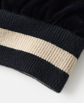 Black ribbed hem with cream stripe trim