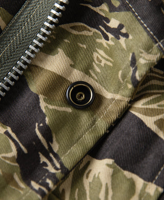 Tiger stripe camo field jacket: olive/dark snap button and ribbed zipper placket detail