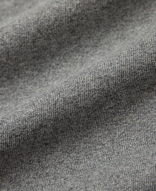 Gray heather knit fabric texture close-up on an athletic t-shirt