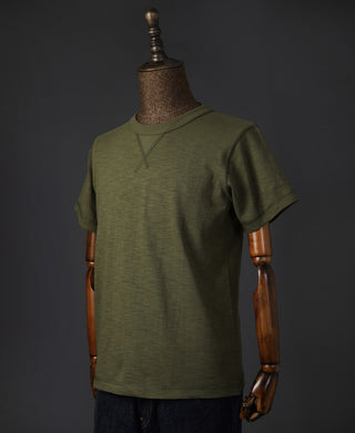 Green cotton tubular gusset t-shirt, crew neck and short sleeves on mannequin