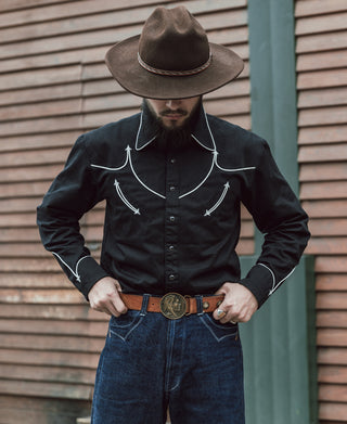 Black western shirt with white embroidered collar and crescent arrow accents