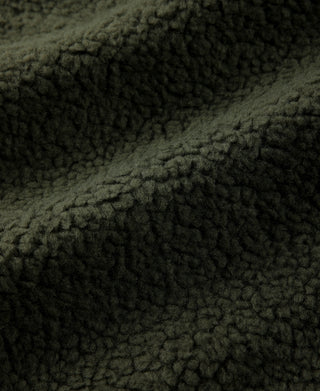 Olive sherpa shearling lining texture close-up