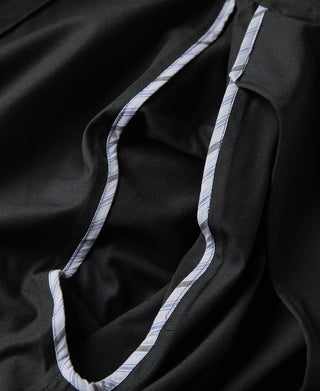 Black all-weather trench coat, contrast striped piping along hood seam