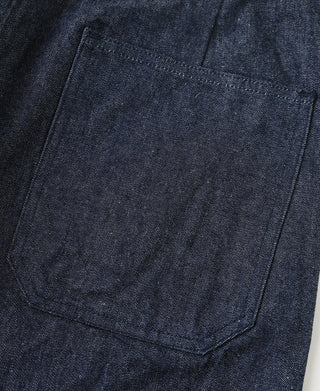 Indigo dungaree trousers back view with large patch pocket
