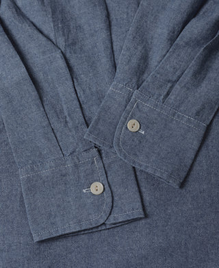 Blue chambray work shirt front with two-button placket and flap pocket