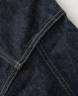 Indigo denim jacket shoulder and yoke seam with yellow contrast stitching