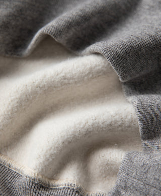 Gray heavyweight sweater with soft interior lining and ribbed stitched edge