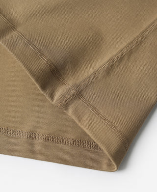 Khaki henley shirt sleeve cuff with stitched hem detail