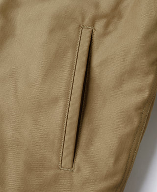 Khaki deck jacket sleeve with stitched trim along side seam