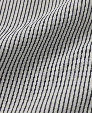 Striped pants fabric with vertical pinstripes in dark and white