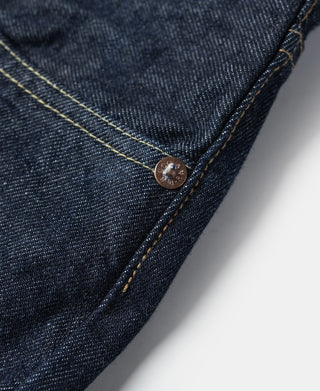 Indigo selvedge denim jeans with copper button and gold topstitching