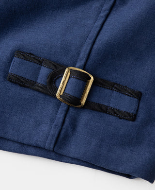 Blue cossack jacket waist tab detail with buckle strap closure