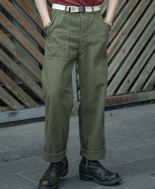 Olive utility fatigue pants with front pleats, belt loops, and cargo pockets