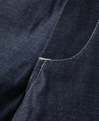 US Army M-40 dungaree fatigue pants in dark indigo denim, close-up of curved seam