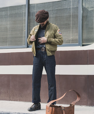 Khaki olive tanker jacket with zip front and sleeve patches
