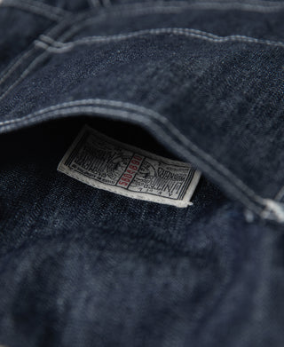 Indigo denim painter pants with woven brand size label inside waistband
