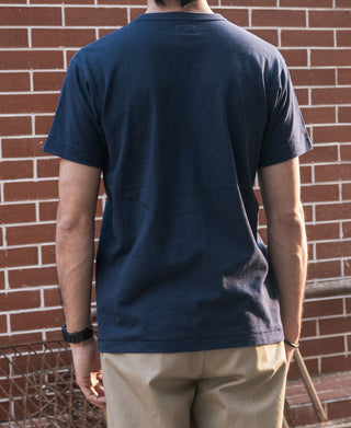 Indigo pocket T-shirt worn by model, back view with short sleeves