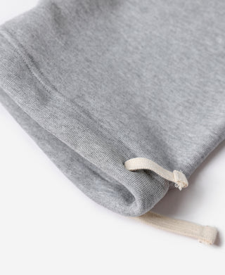 Gray heavyweight terry sweatpants cuff with off-white drawstring ends
