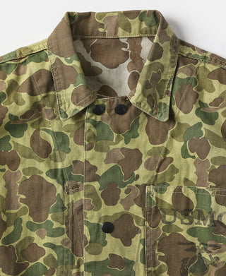 Duck hunter camo jacket front view with snap placket and two buttoned flaps.
