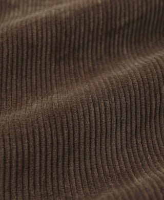 Brown 8-wale corduroy trousers, vertical ribbed texture close-up