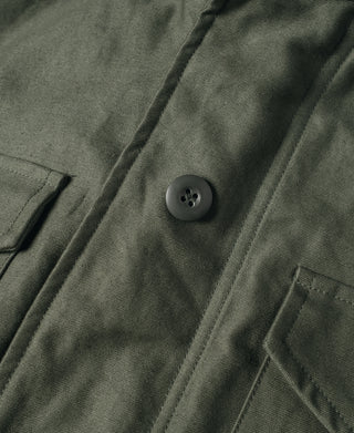 US Army M-65 field jacket, olive front placket with button and side pocket flap