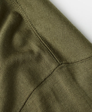 Olive wool knit shirt shoulder seam and collar edge
