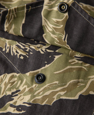 Tiger stripe camo field jacket: front placket with snap buttons and folded collar