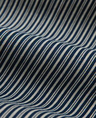 Blue-and-cream striped fabric close-up for a cossack jacket