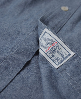 Blue chambray work shirt neckline label inside collar