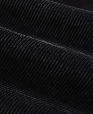 Black 9-wale corduroy jacket fabric texture close-up