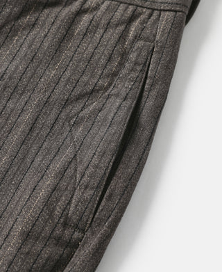 Brown pinstripe pants front with pleats and crease detail
