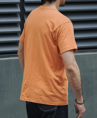 Orange slub cotton crewneck t-shirt back view with short sleeves.