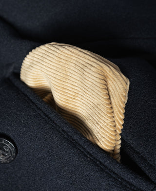 Navy peacoat inner collar lining with ribbed cream detail