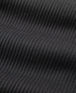 Black ribbed knit fabric texture detail for long-sleeve henley shirt