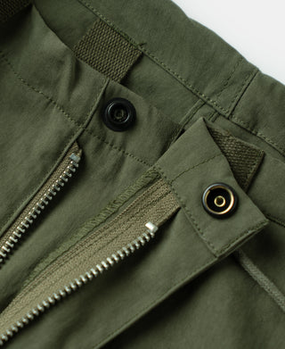 Olive shell arctic trousers with front snap and exposed zipper track