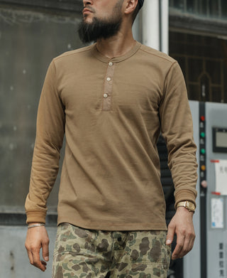 Khaki long-sleeve henley shirt with button placket