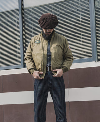 Khaki olive tanker jacket with stand collar, zip front, shoulder patch