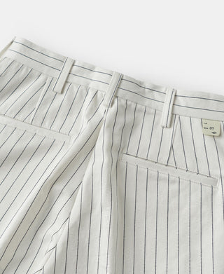 White striped mechanic work pants with button waistband and front pleats